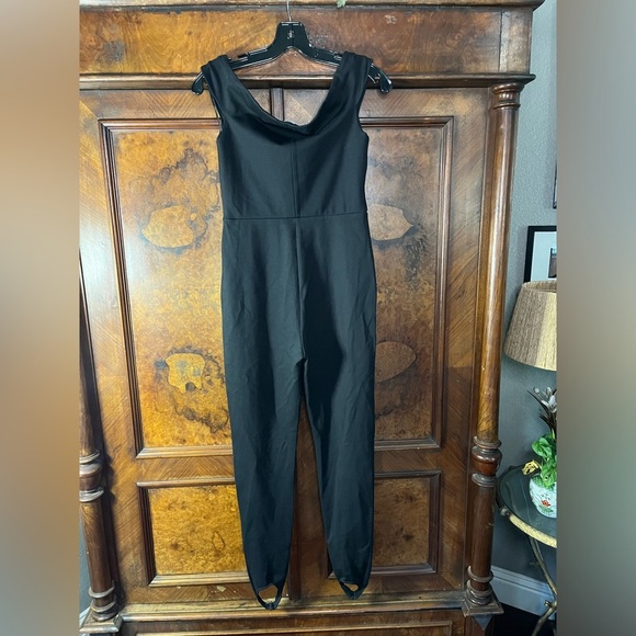 EUC Reformation- Off the Shoulder Stretchy Jumpsuit with Stirrups. Size M. - Picture 2 of 8